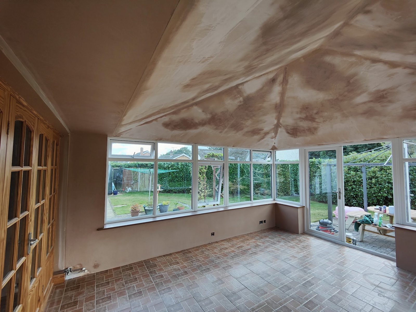 Conservatory ceiling boarded and plastered, still drying